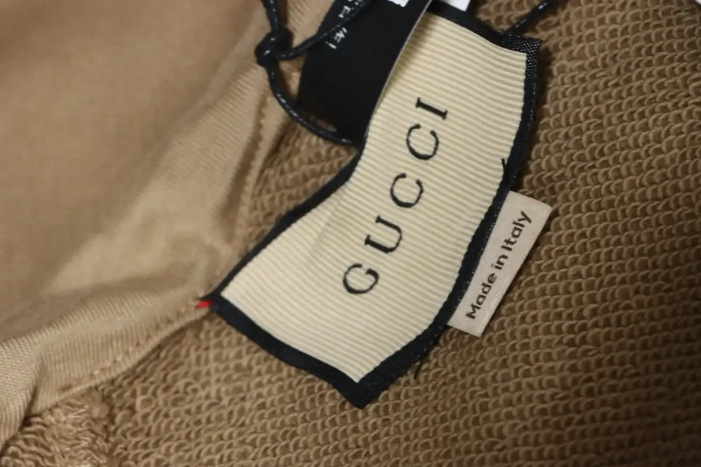 GU Half-Zip Hoodie With Woven Pattern In Red And Green - Image 9