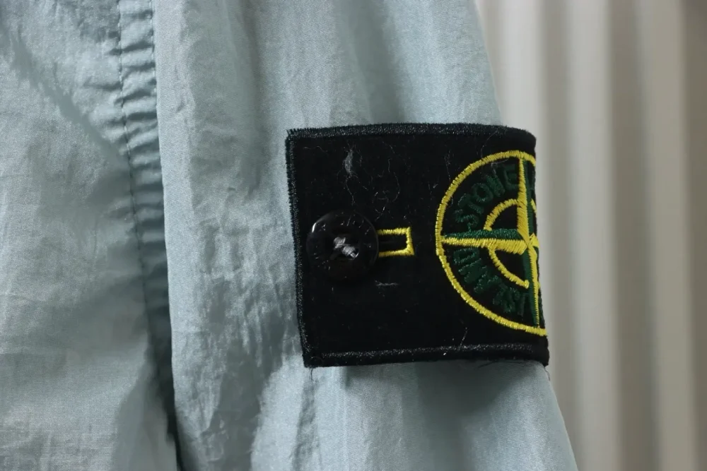 SI Plain jacket with logo patch on the lapel and one pocket as well as zip closure XXL - Image 16