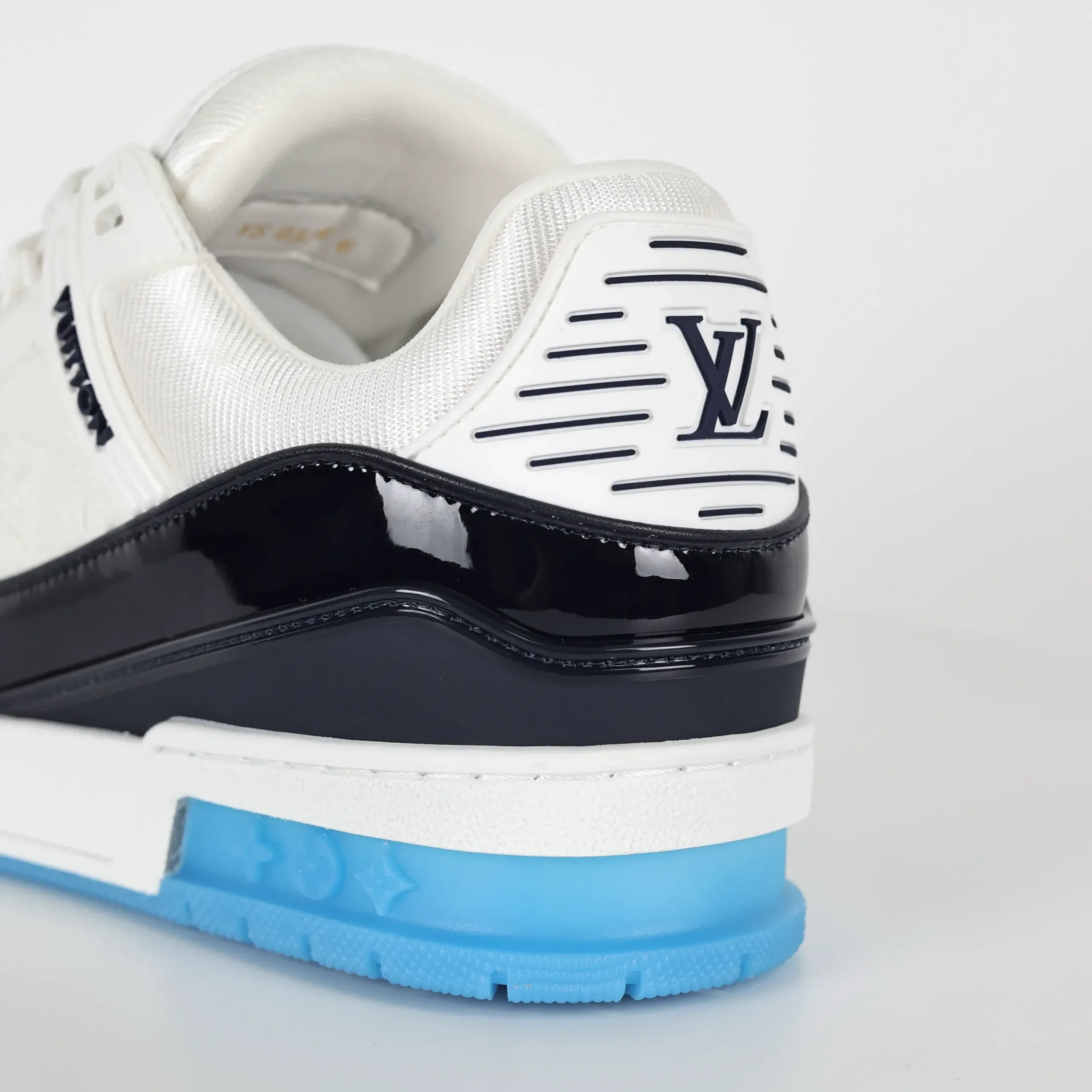 Trainer Monogram Sneakers In White Grained Calfskin And Black And Blue Patent Leather - Image 12