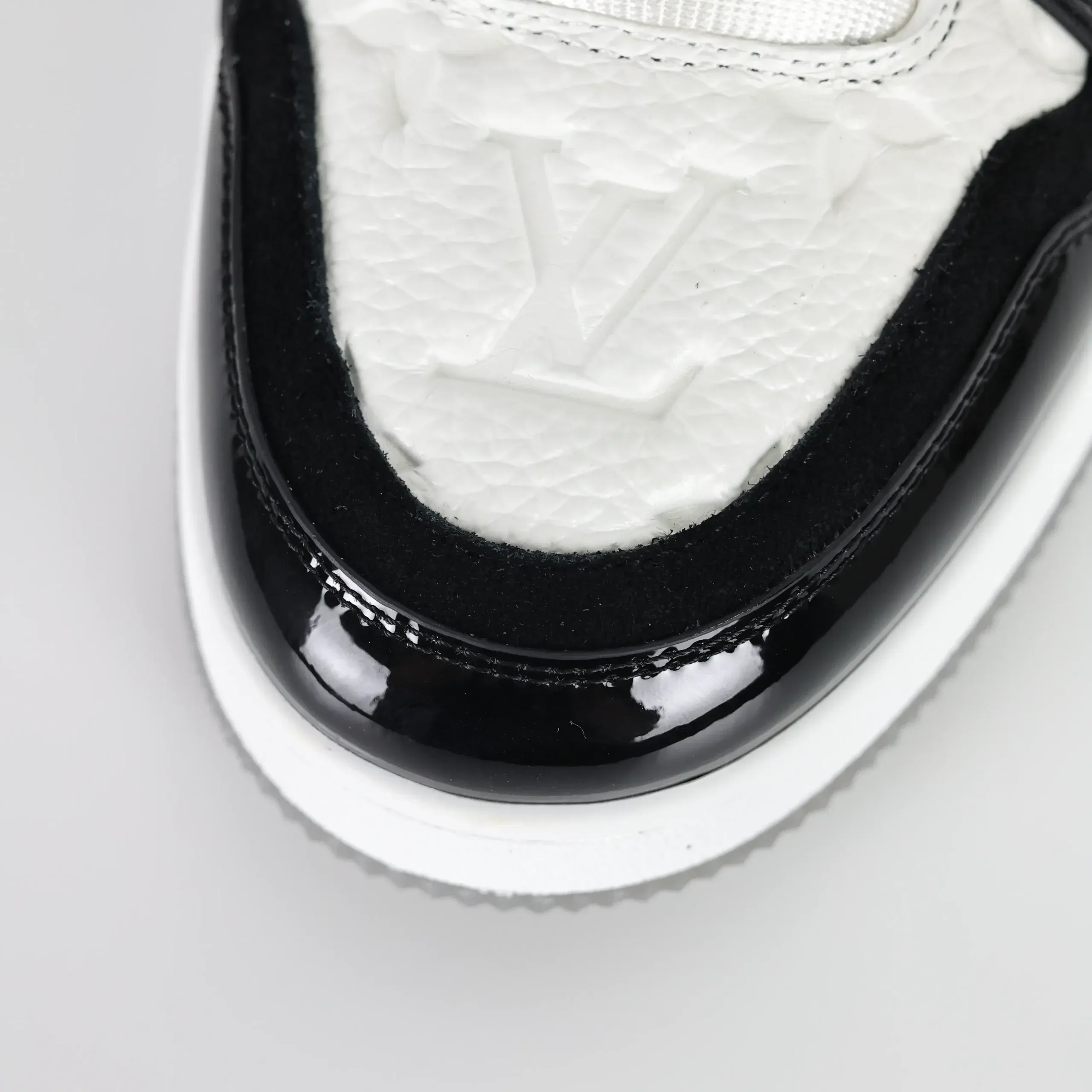 Trainer Monogram Sneakers In White Grained Calfskin And Black Patent Leather - Image 11
