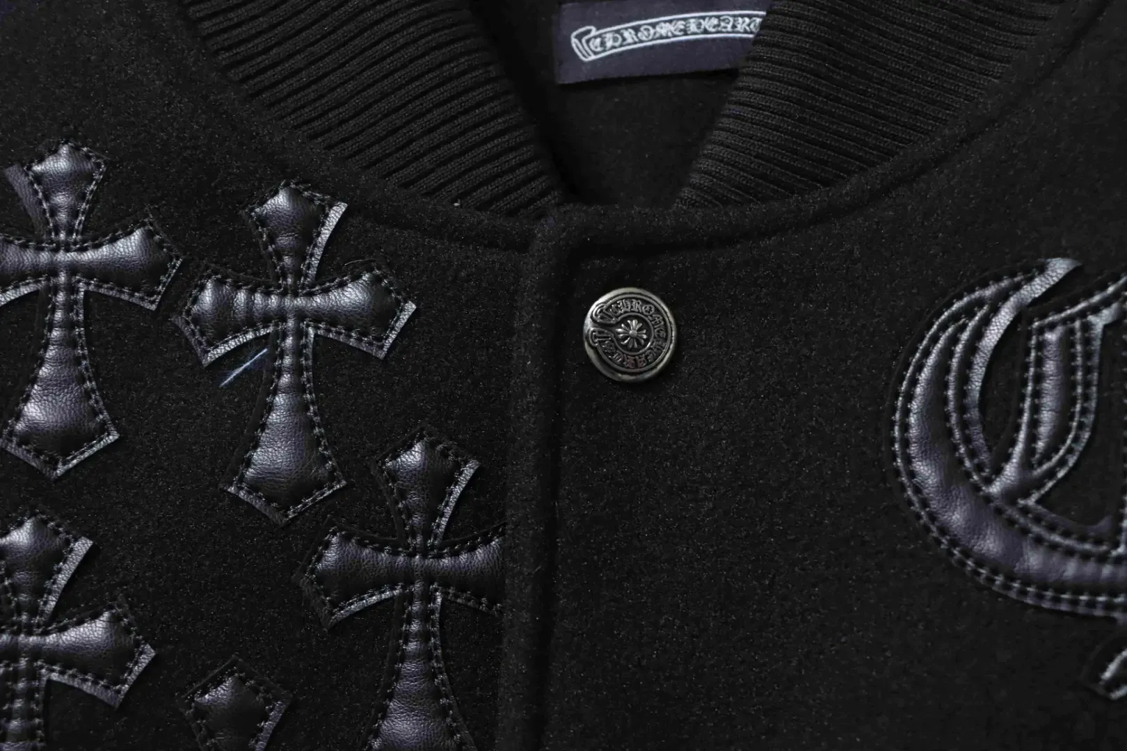 Leather baseball jacket with cross pattern and several brand logos on the sleeves XXL - Image 10