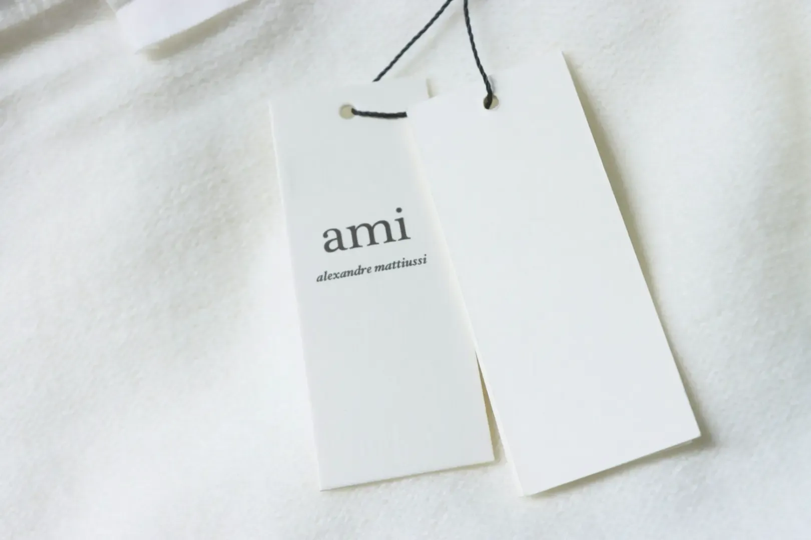 AMI Sweater In A Minimalist French Style With A Round Neckline And A Silver Heart Logo - Image 10