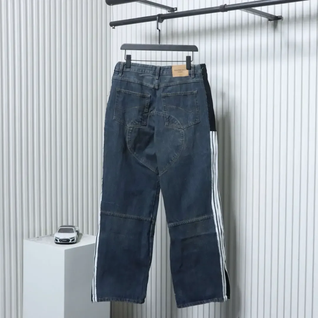 Balenciaga Jeans With A Cut Out Patchwork Design And Circular Embroidery - Image 2