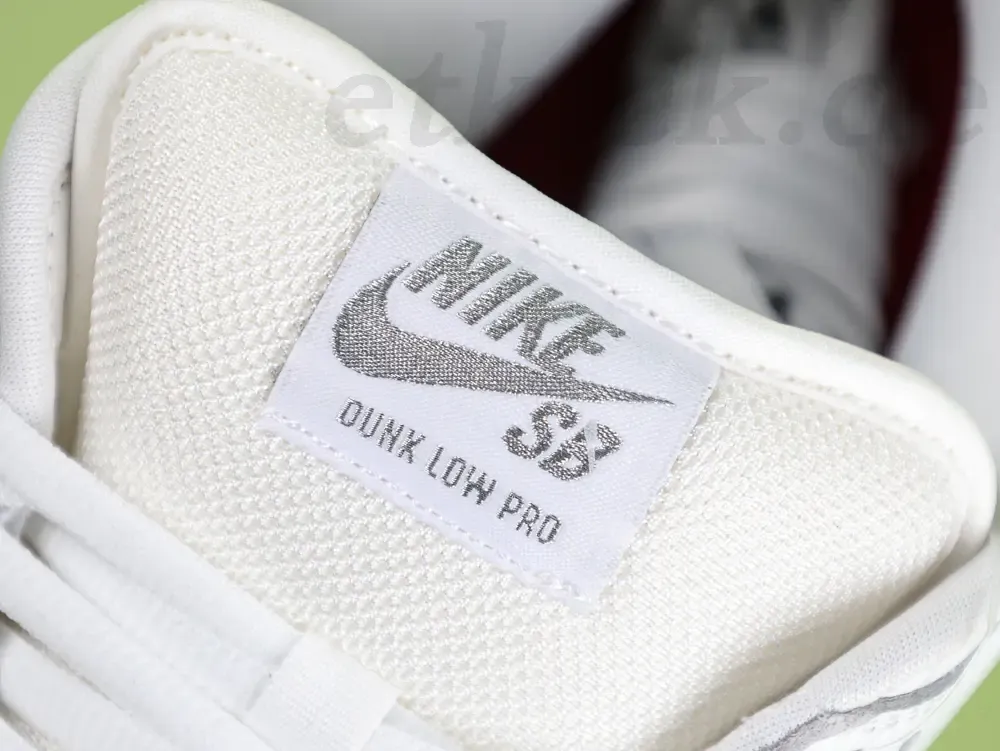 Dunk Low Supreme White Sneakers - Image 11