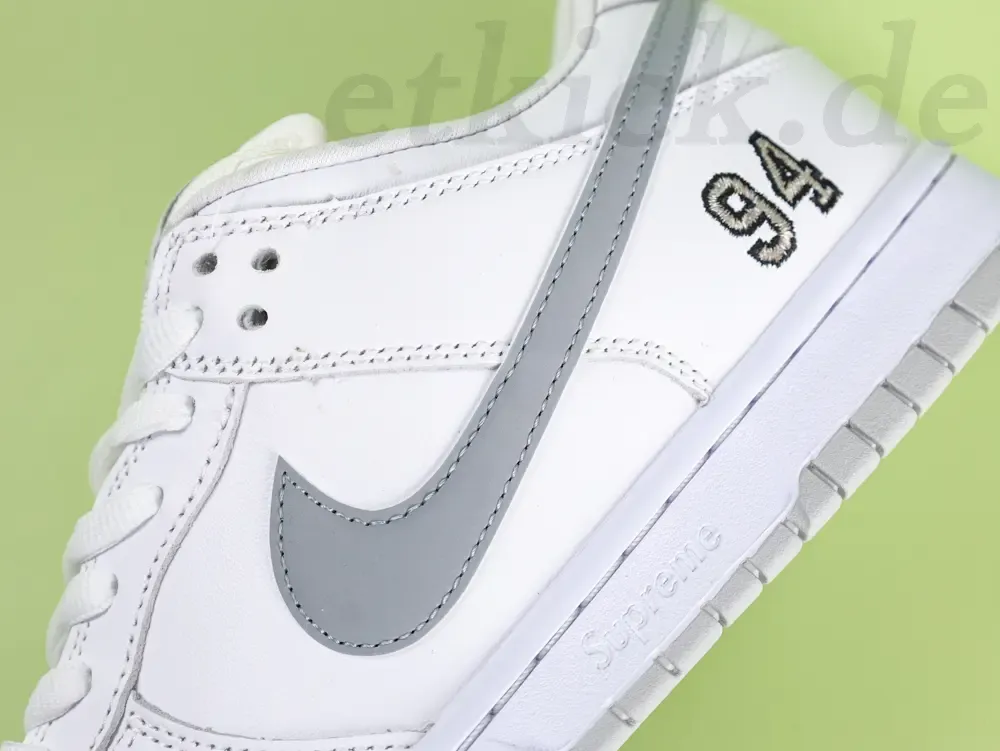 Dunk Low Supreme White Sneakers - Image 8