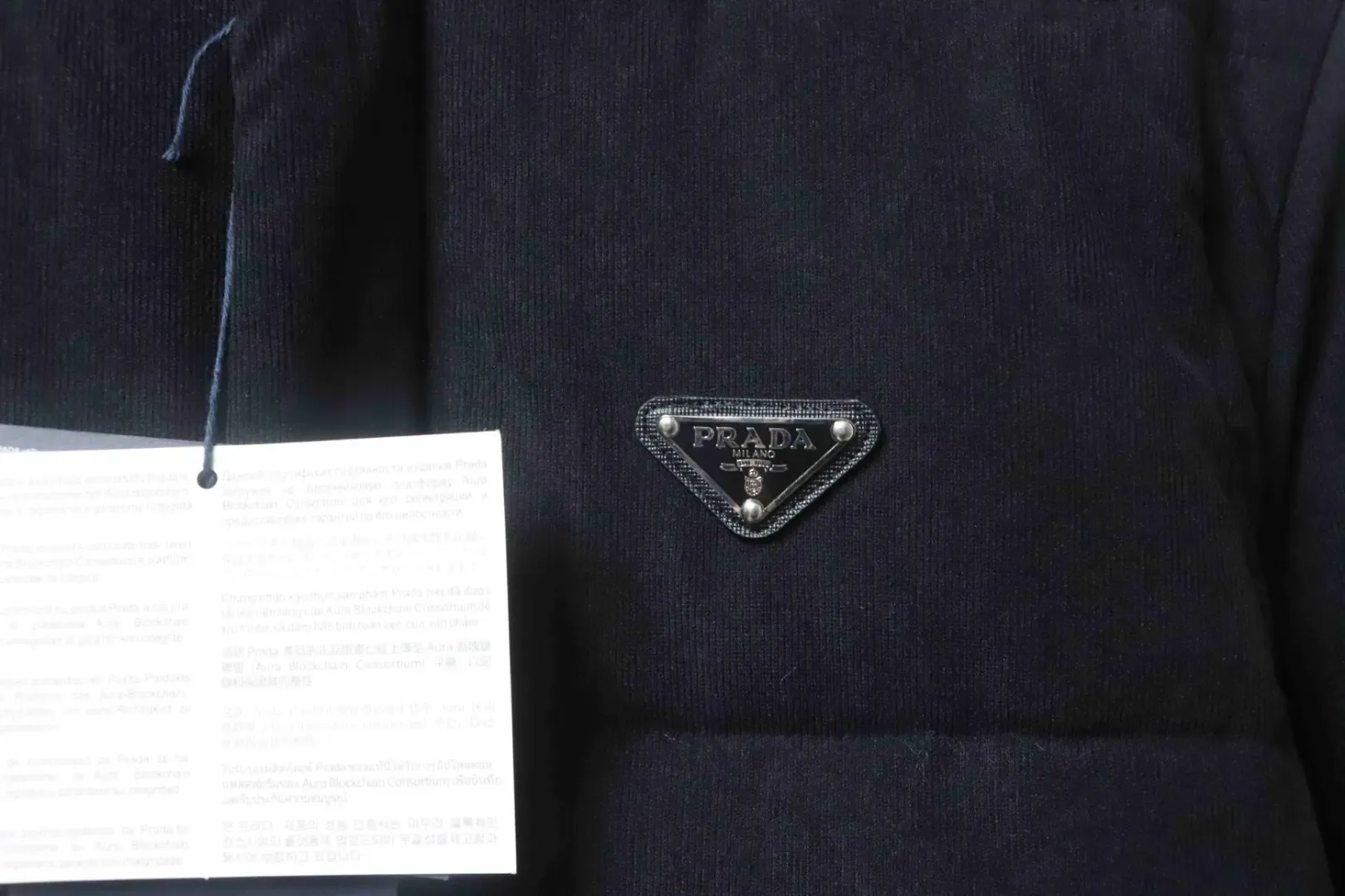 New Down Jacket With A Detachable Triangular Logo - Image 9