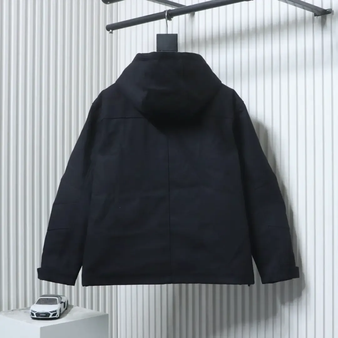 Trench Coat With Monogram Embossing And Cargo Pockets, And A Down Jacket With A Zipper - Image 2