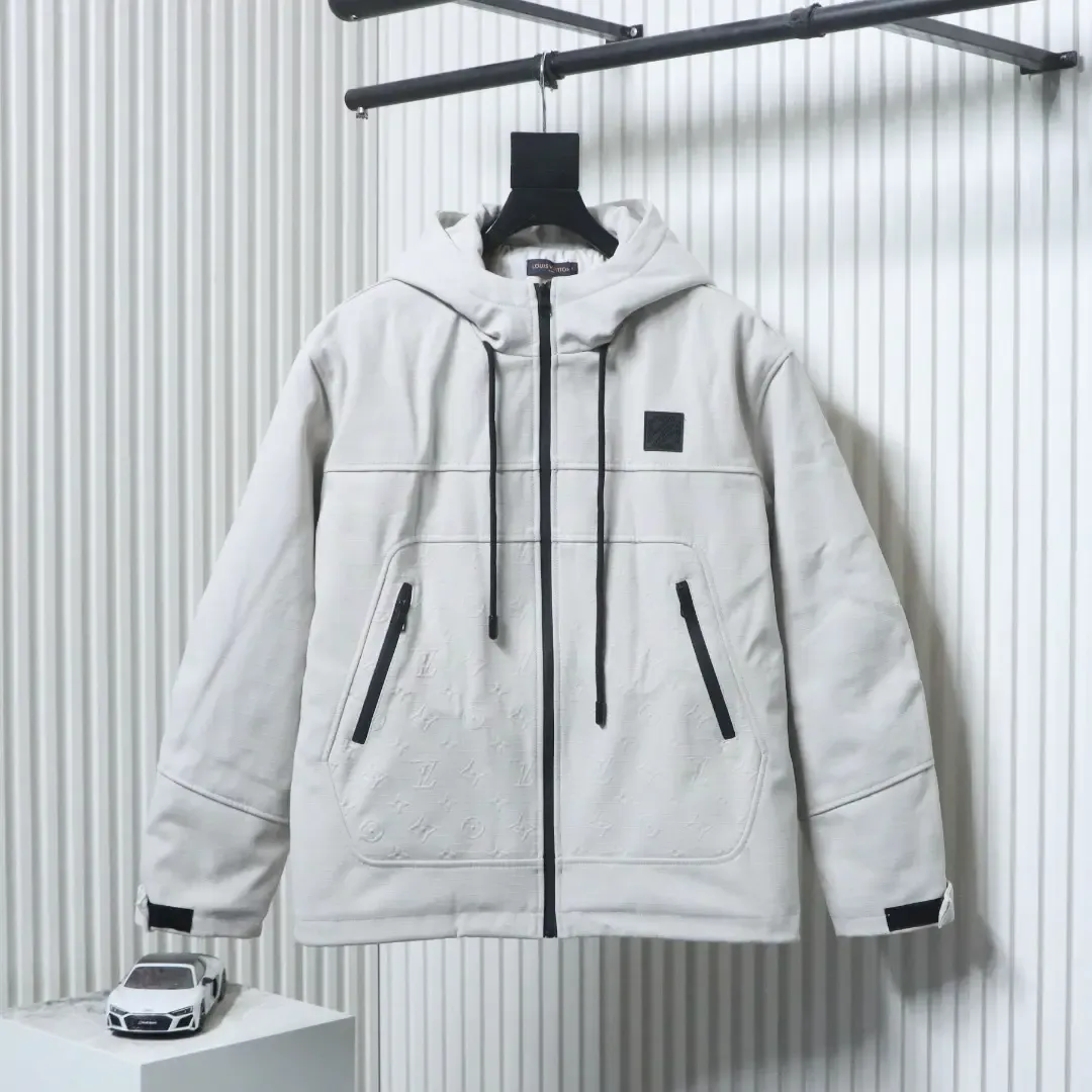 Trench Coat With Monogram Embossing And Cargo Pockets, And A Down Jacket With A Zipper - Image 12