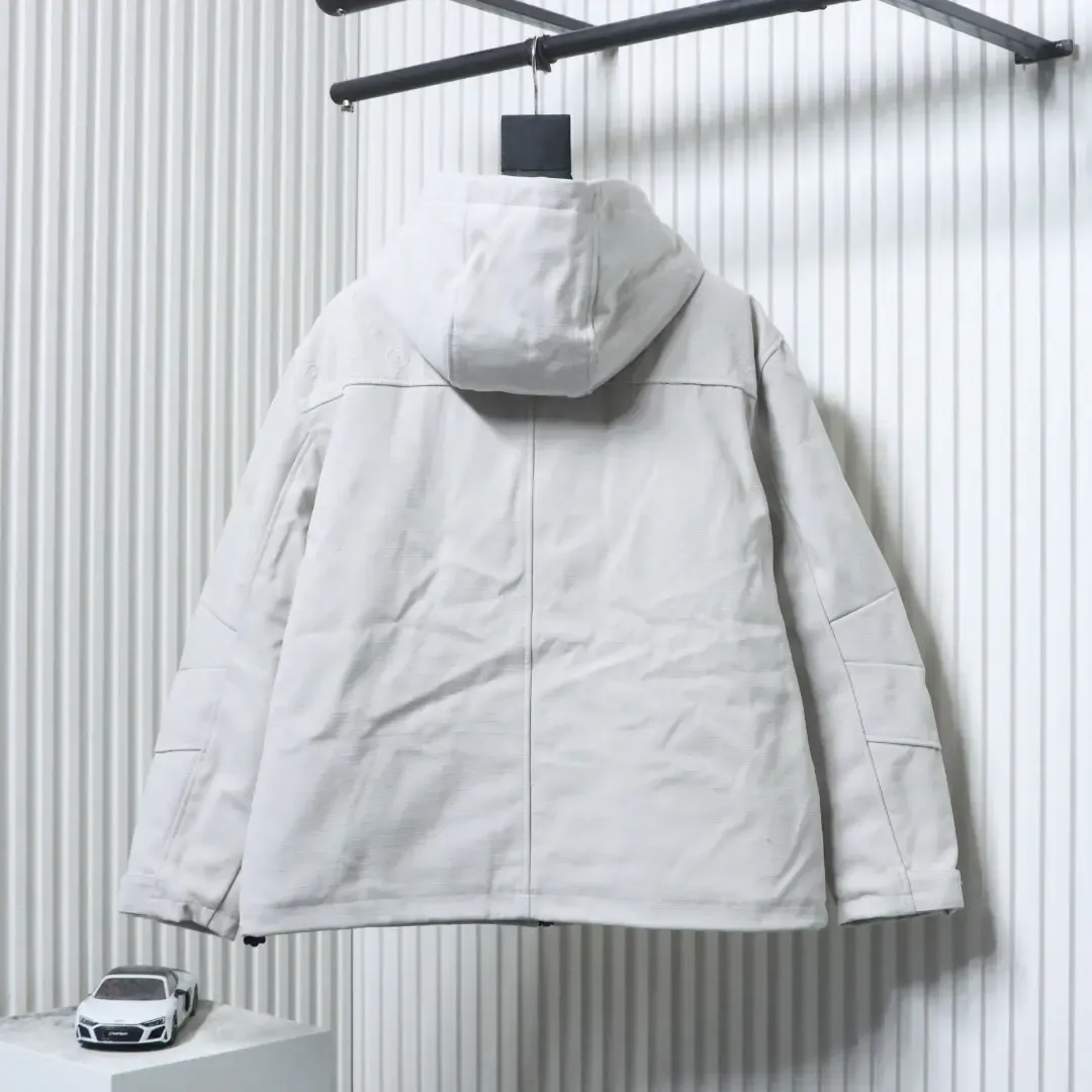 Trench Coat With Monogram Embossing And Cargo Pockets, And A Down Jacket With A Zipper - Image 13