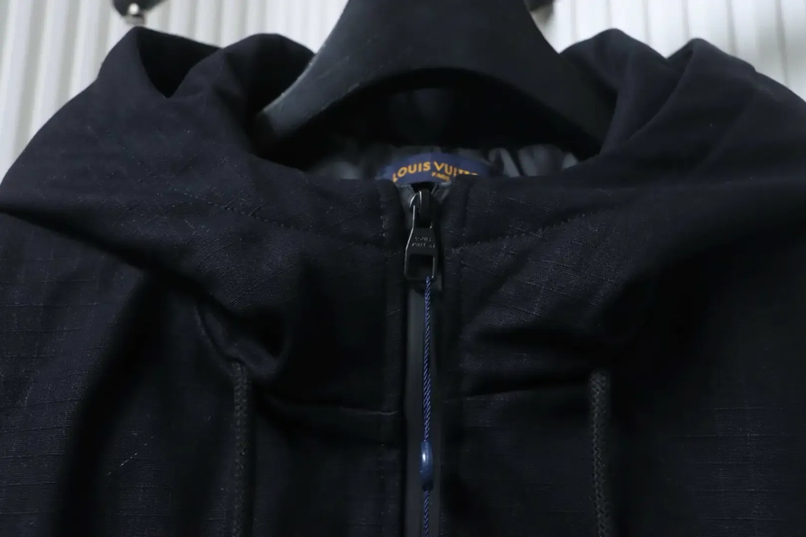 Trench Coat With Monogram Embossing And Cargo Pockets, And A Down Jacket With A Zipper - Image 3