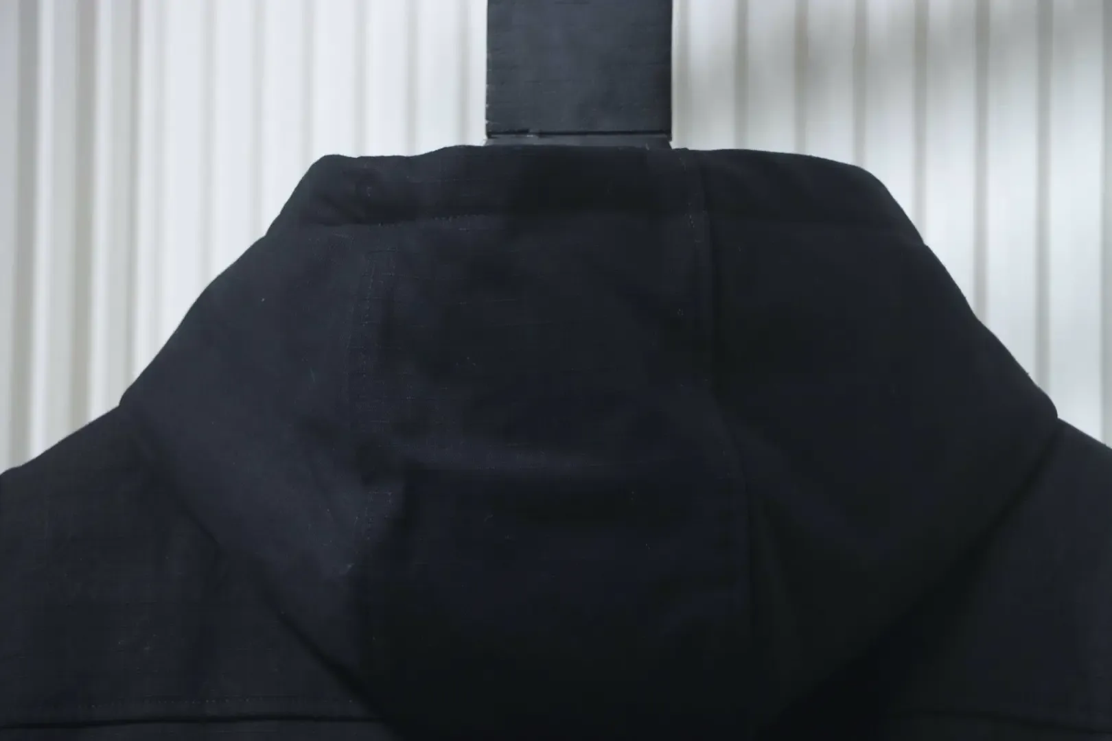 Trench Coat With Monogram Embossing And Cargo Pockets, And A Down Jacket With A Zipper - Image 4