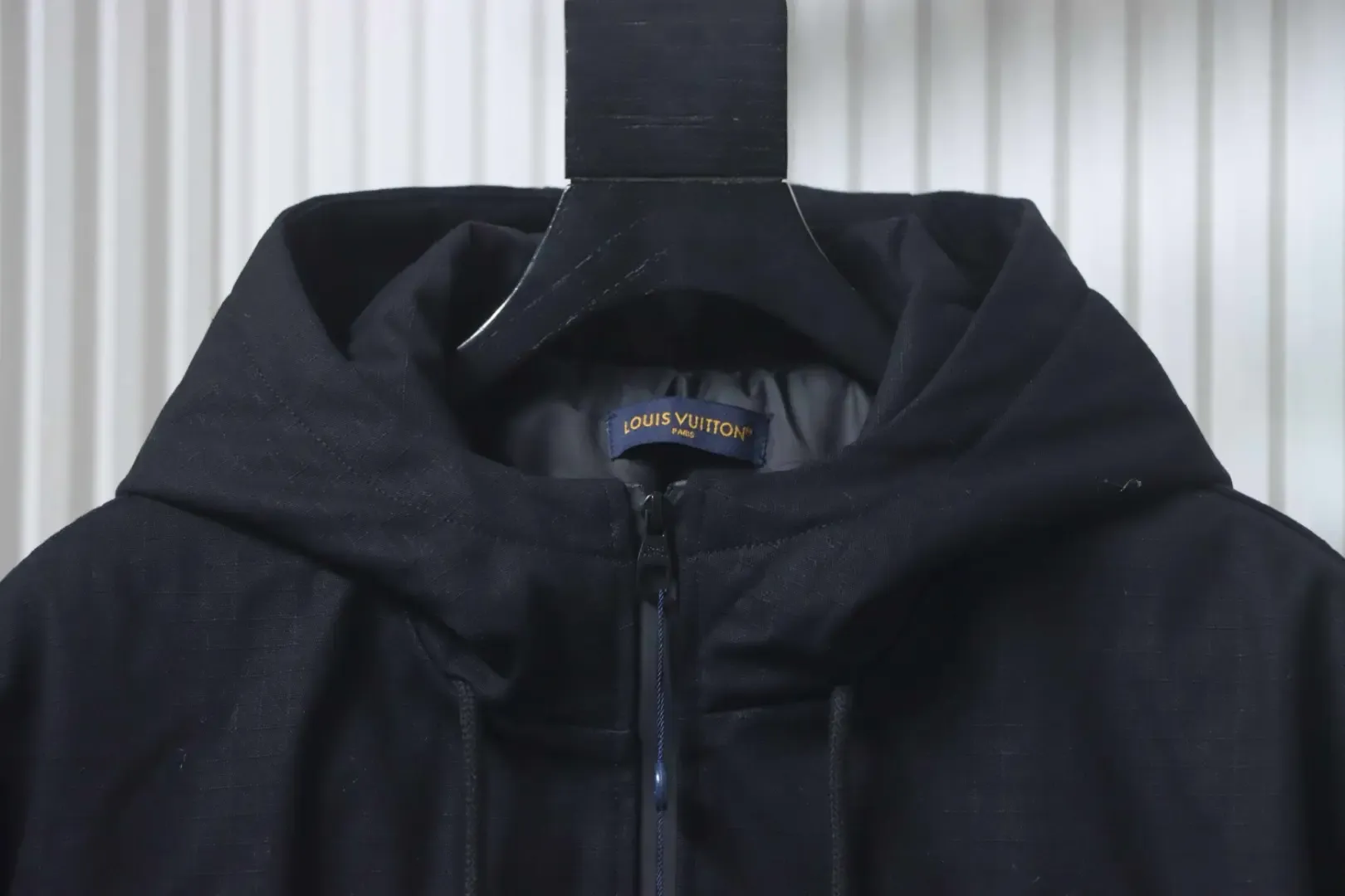 Trench Coat With Monogram Embossing And Cargo Pockets, And A Down Jacket With A Zipper - Image 5