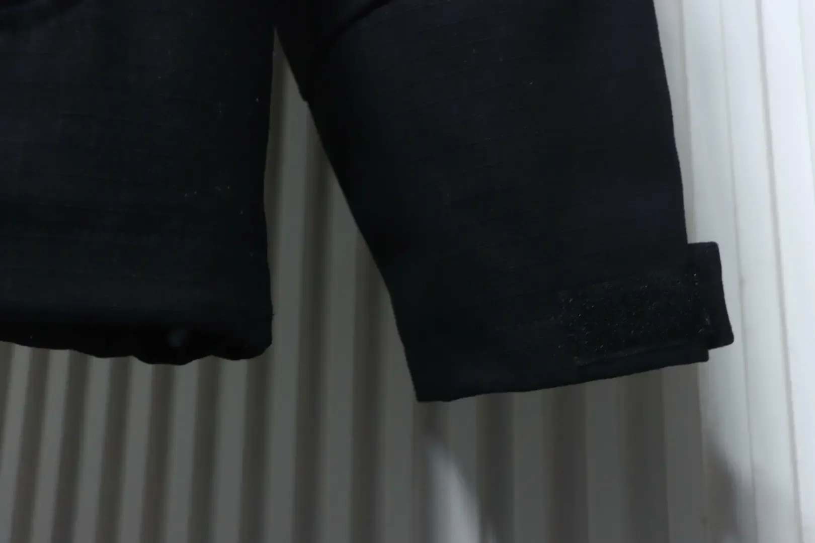 Trench Coat With Monogram Embossing And Cargo Pockets, And A Down Jacket With A Zipper - Image 6