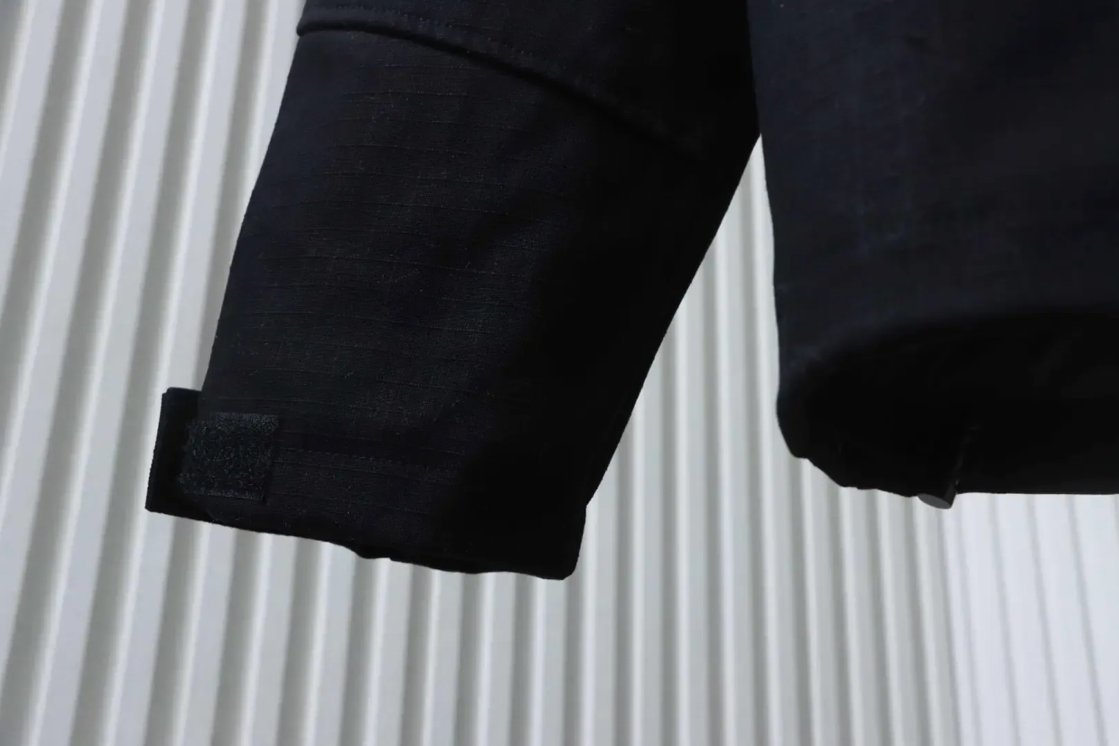 Trench Coat With Monogram Embossing And Cargo Pockets, And A Down Jacket With A Zipper - Image 7