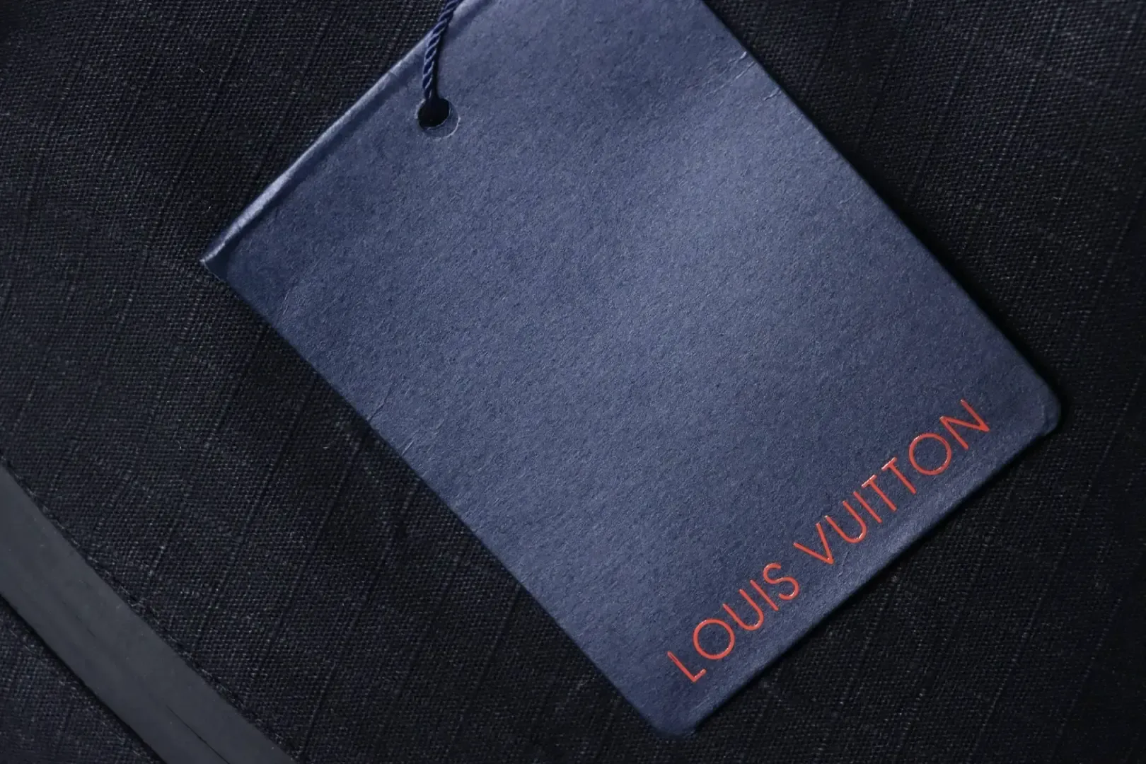 Trench Coat With Monogram Embossing And Cargo Pockets, And A Down Jacket With A Zipper - Image 10