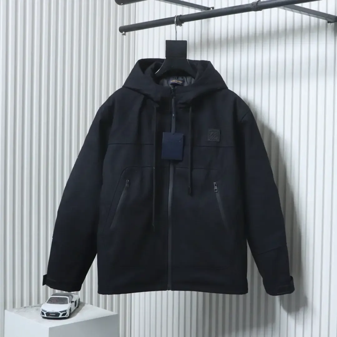 Trench Coat With Monogram Embossing And Cargo Pockets, And A Down Jacket With A Zipper