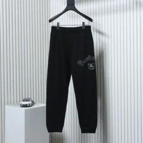 Trousers with embroidered letters and the War Horse logo