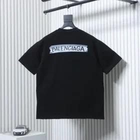 Balenciaga short-sleeved T-shirt in a distressed look with letter print made of adhesive tape on the back