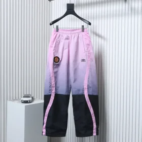 Trousers with color gradient and embroidered logo